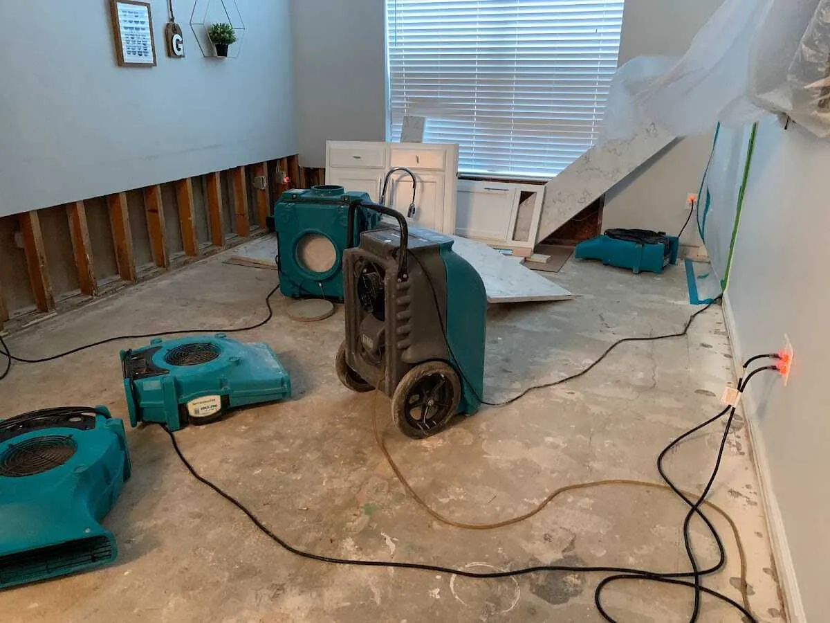 Dehumidifier in flood-cut room for Water Extraction & Removal in Grimes